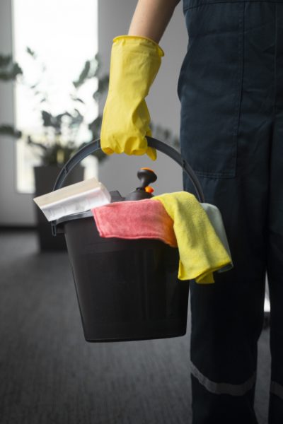 front-view-man-cleaning-indoors